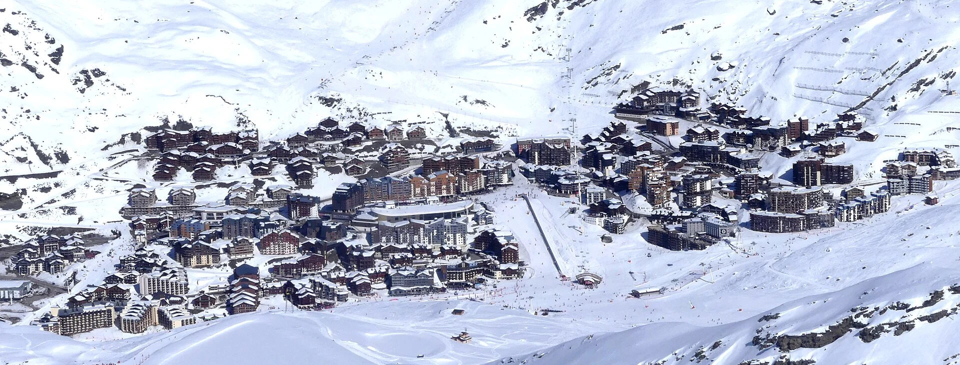 Snow-covered buildings and slopes at Val Thorens in February 2024